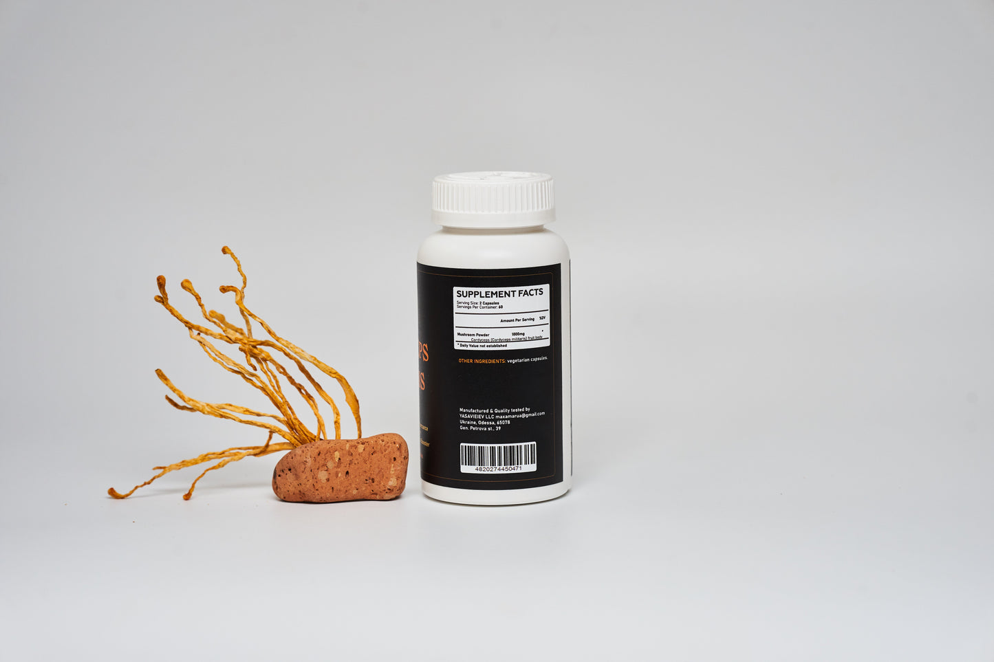 
                  
                    Cordyceps militaris mushroom in capsules
                  
                