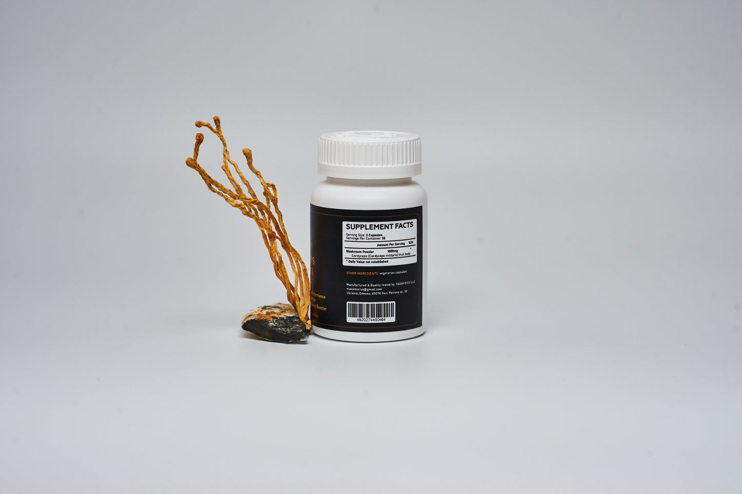 
                  
                    Cordyceps militaris mushroom in capsules
                  
                